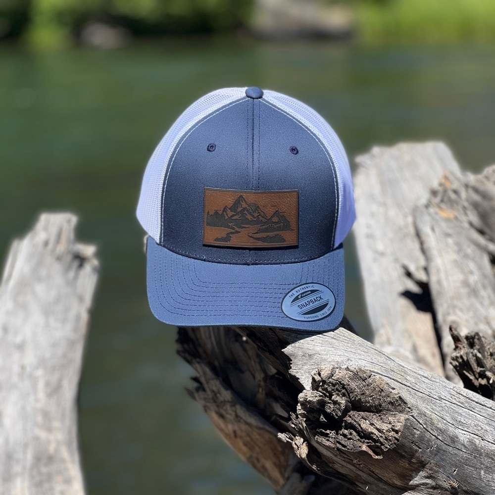 Brand New Navy and White Tucker Hat.